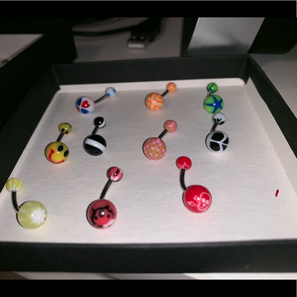 Cute plastic designed belly rings (brand new)